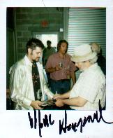 MERLE signing stuff for me in a photo which was also signed obviosly